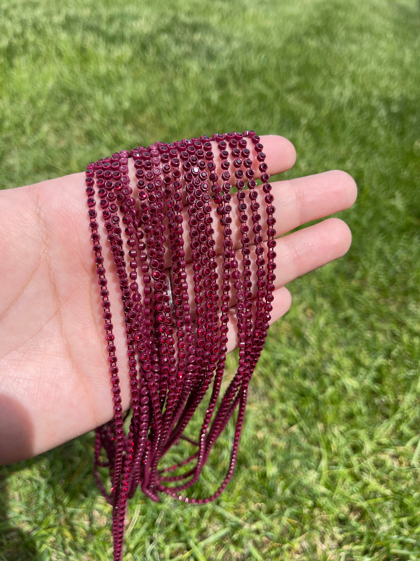 Maroon with Red Stone Plastic Banding - A105